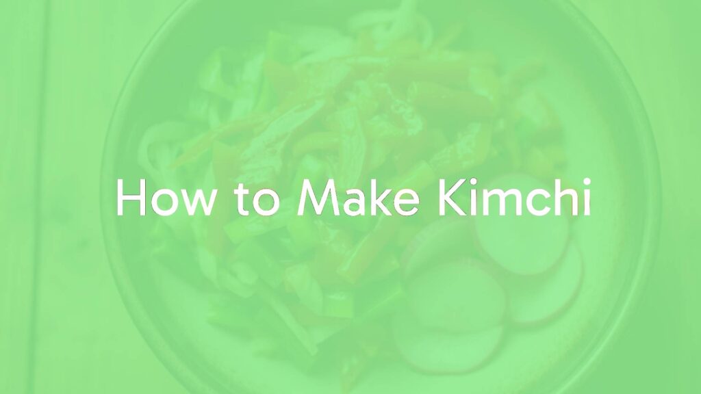 Freshly made kimchi in a traditional Korean bowl, vibrant red and green colors, napa cabbage and radish slices, rustic wooden background, appetizing and authentic.